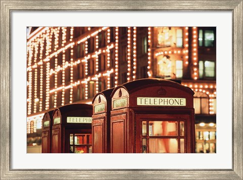 Framed Lit Telephone booth at Harrods, Knightsbridge, London, England Print