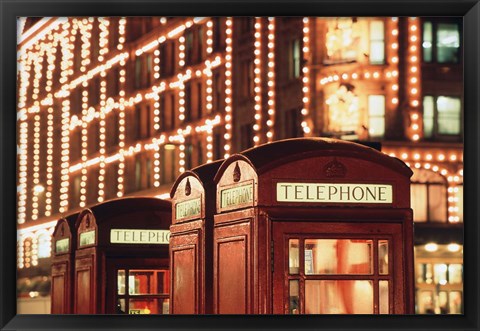 Framed Lit Telephone booth at Harrods, Knightsbridge, London, England Print