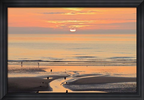 Framed Sunset and beach, Blackpool, England Print