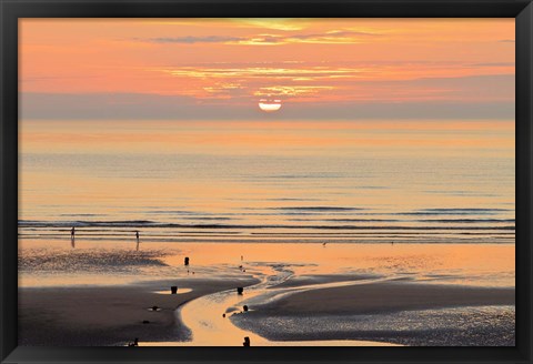 Framed Sunset and beach, Blackpool, England Print