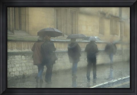 Framed Walking in the rain, Oxford University, England Print