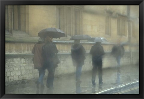 Framed Walking in the rain, Oxford University, England Print