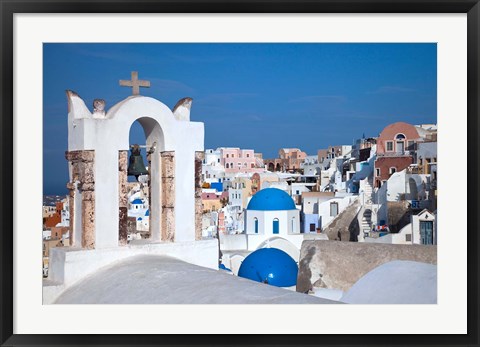 Framed Bell tower and blue domes of church in village of Oia, Santorini, Greece Print