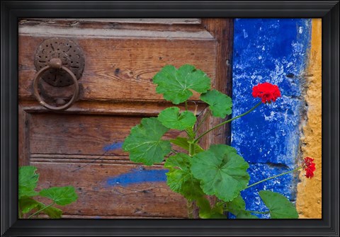 Framed Geraniums and old door in Chania, Crete, Greece Print