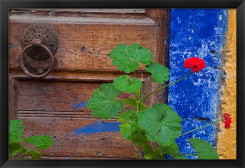 Framed Geraniums and old door in Chania, Crete, Greece Print