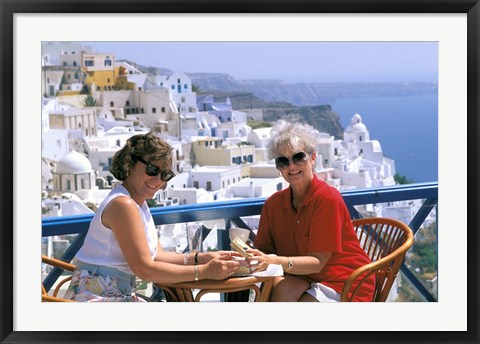 Framed Women Having Coffee on Cafe Terrace, Santorini, Greece Print
