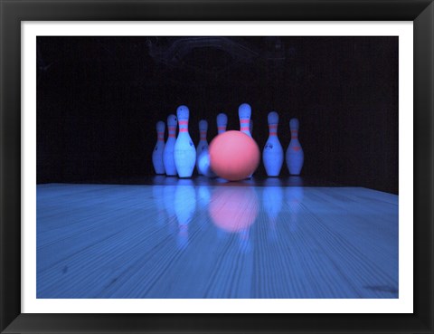 Framed Bowling ball with bowling pins Print