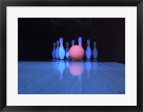 Framed Bowling ball with bowling pins Print