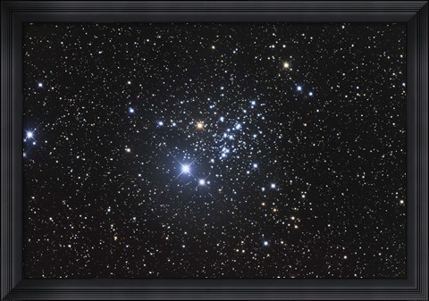 Framed NGC 457 is an open star cluster in the Constellation Cassiopeia Print