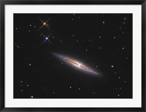 Framed NGC 4013 is an edge-on unbarred spiral galaxy in the Constellation Ursa Major Print