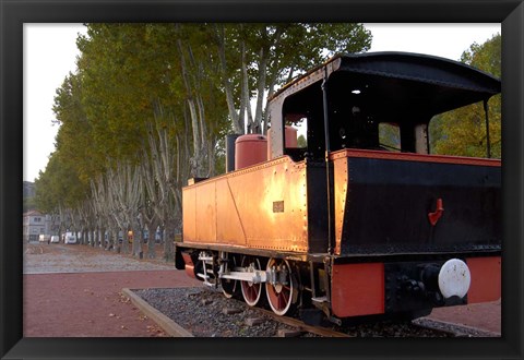 Framed Train Display along Riverbank Print