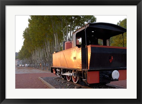 Framed Train Display along Riverbank Print