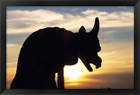 Framed Chimera of Notre Dame Cathedral at Sunset Print