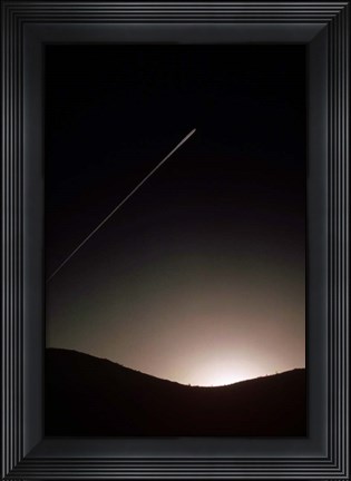Framed Contrail At Dusk Print