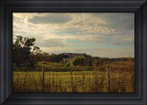 Framed Rusty Barn At Sunset Print