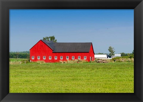 Framed Red barn in Grenville County in Ontario, Canada Print