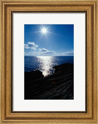 Framed Sunstar Over Yellowstone Lake Print