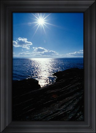 Framed Sunstar Over Yellowstone Lake Print