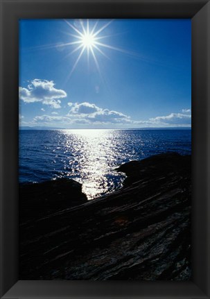 Framed Sunstar Over Yellowstone Lake Print