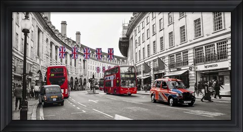 Framed Buses and taxis in Oxford Street, London Print