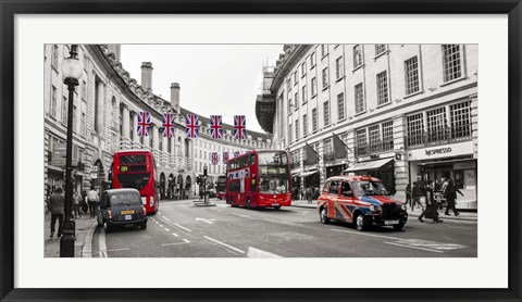 Framed Buses and taxis in Oxford Street, London Print