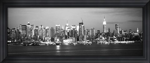Framed Skyscrapers lit up at night in a city, Manhattan, NY Print