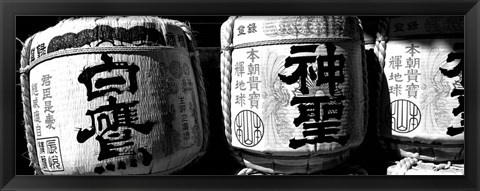 Framed Close-up of three dedicated sake barrels, Imamiya Temple, Kita-ku, Kyoto, Japan Print