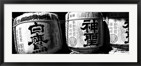 Framed Close-up of three dedicated sake barrels, Imamiya Temple, Kita-ku, Kyoto, Japan Print