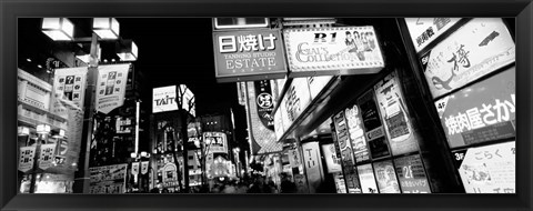 Framed Commercial signboards lit up at night in a market, Shinjuku Ward, Tokyo, Japan Print