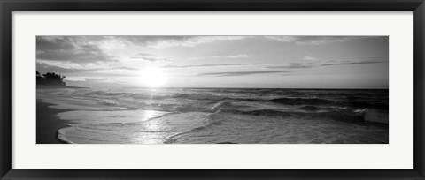 Framed Sunset over the sea Print