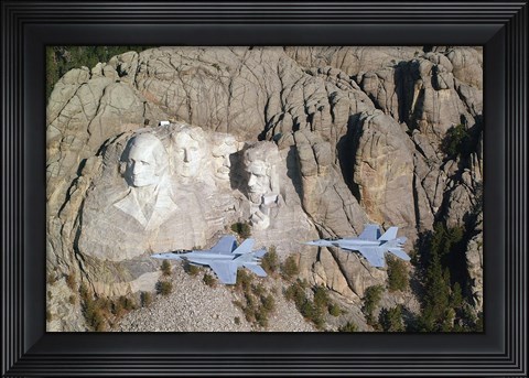 Framed Two F/A-18E Super Hornets conduct a fly by of Mount Rushmore Print