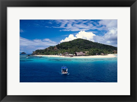 Framed Boat Approaching Castaway Island Resort, Mamanuca Islands, Fiji Print