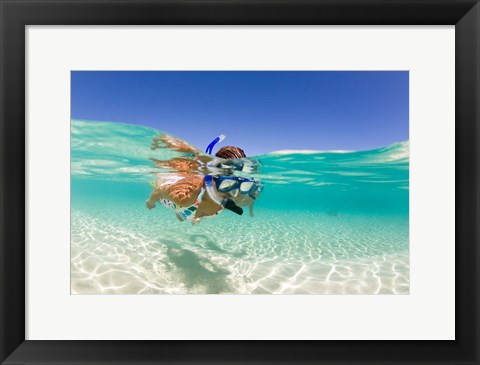 Framed Couple snorkeling, Beqa Island, Fiji Print