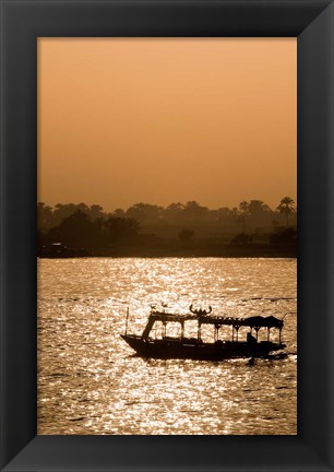 Framed Egypt, Luxor Water taxi at sunset Nile River Print