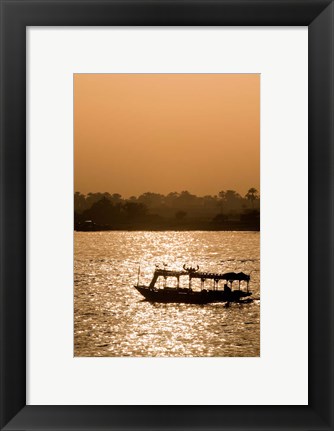 Framed Egypt, Luxor Water taxi at sunset Nile River Print