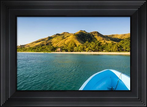 Framed Blue boat cruising through the Yasawa, Fiji, South Pacific Print
