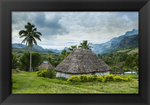 Framed Traditional thatched roofed huts in Navala, Fiji, South Pacific Print