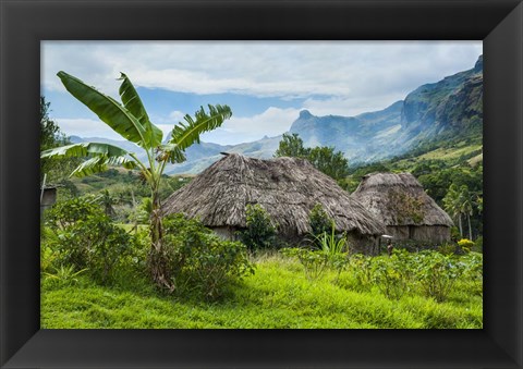 Framed Traditional thatched roofed huts in Navala, Fiji Print