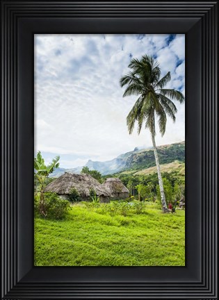 Framed Traditional thatched roofed huts in Navala in the Ba Highlands of Viti Levu, Fiji, South Pacific Print