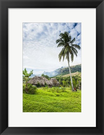 Framed Traditional thatched roofed huts in Navala in the Ba Highlands of Viti Levu, Fiji, South Pacific Print