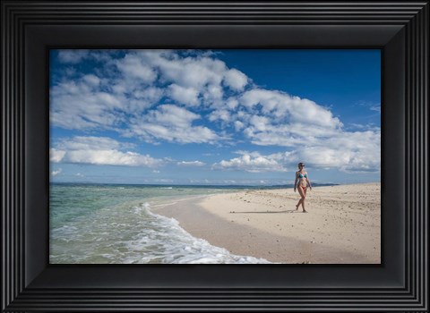Framed Woman walking on white sand beach of Beachcomber Island, Mamanucas Islands, Fiji Print