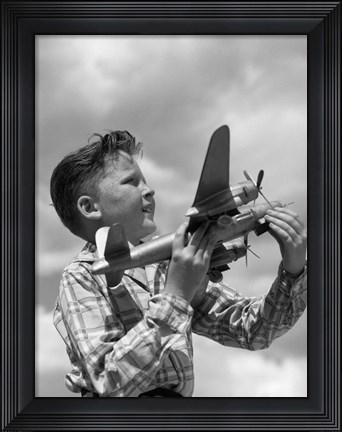 Framed 1930s 1940s 1950s  Freckle-Faced Boy Holding Airplane Print