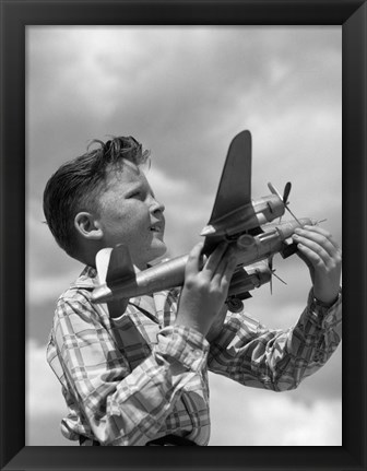 Framed 1930s 1940s 1950s  Freckle-Faced Boy Holding Airplane Print