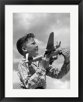 Framed 1930s 1940s 1950s  Freckle-Faced Boy Holding Airplane Print
