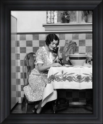 Framed 1920s Woman Sitting At Kitchen Table Print