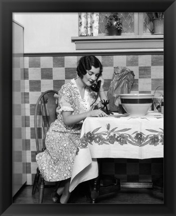 Framed 1920s Woman Sitting At Kitchen Table Print