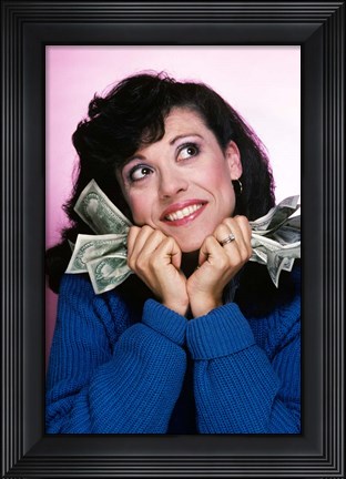 Framed Excited Brunette Woman Holding Several Dollar Bills Print