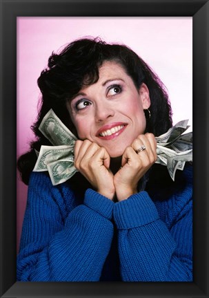 Framed Excited Brunette Woman Holding Several Dollar Bills Print