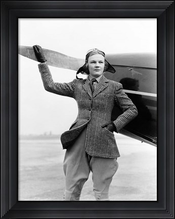 Framed 1930s Woman Aviator Pilot Standing Next To Airplane Print