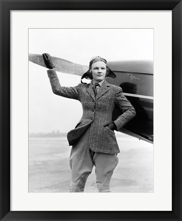 Framed 1930s Woman Aviator Pilot Standing Next To Airplane Print